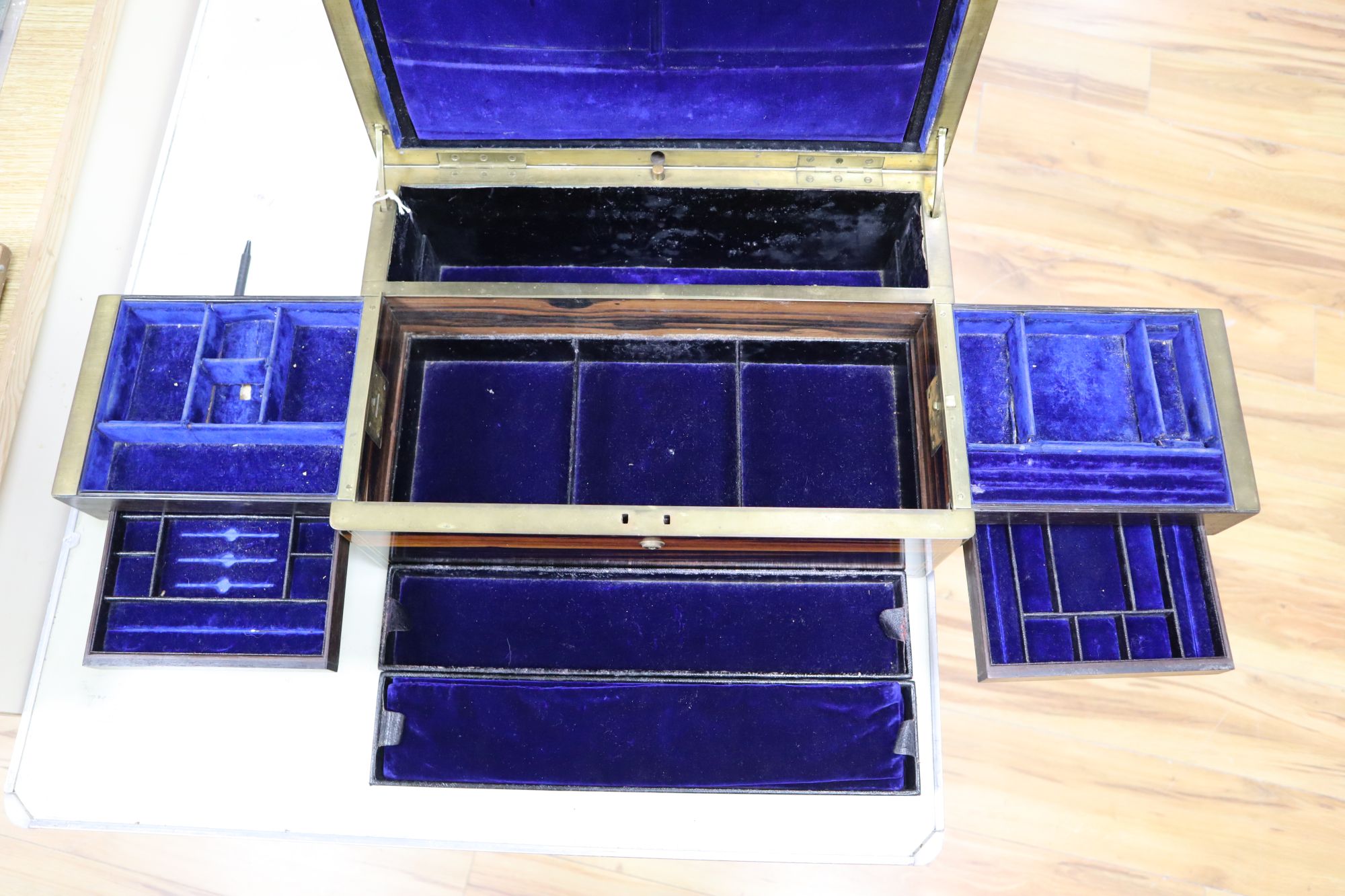 A Victorian calamander and brass-mounted inlaid jewellery box, width 42cm height 18cm